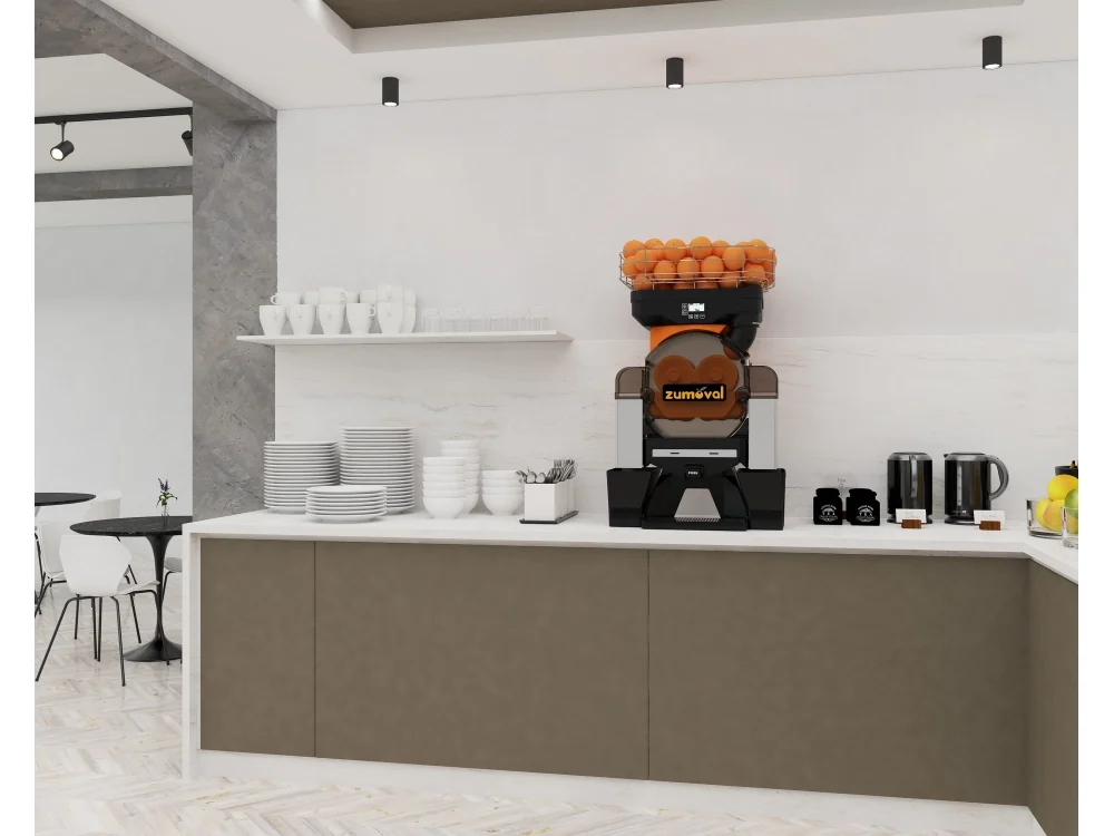 Exprimidora ZUMOVAL Top sobre el mostrador de un restaurante o cafetería